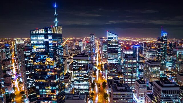 Nighttime City Skyline with Illuminated Skyscrapers and Lights Stock Video 4K Ultra Full HD Stock Video Footage Download