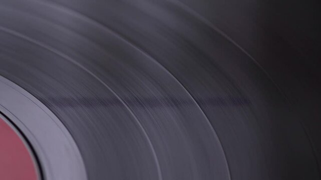 vinyl record spinning macro , turntable close up