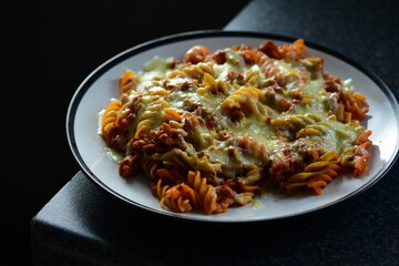 bolognese pasta with beef and cheese
