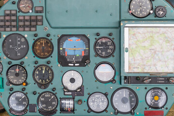 Old soviet military fighter jet green dashboard with old analog displays