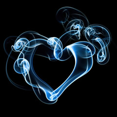 Heart Shape Formed by Blue Smoke on Black Background