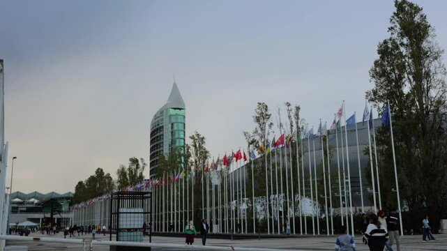 A large building with country flags on the side. Parque das Nacoes, Lisbon,