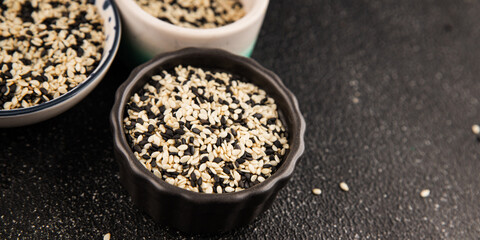 Sesame spice mix white and black tasty fresh gourmet food background on table rustic food top view copy space keto and paleo diet vegetarian and vegan food