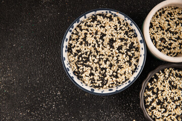 Sesame spice mix white and black tasty fresh gourmet food background on table rustic food top view copy space keto and paleo diet vegetarian and vegan food