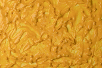 Yellow sauce splashes as a background.