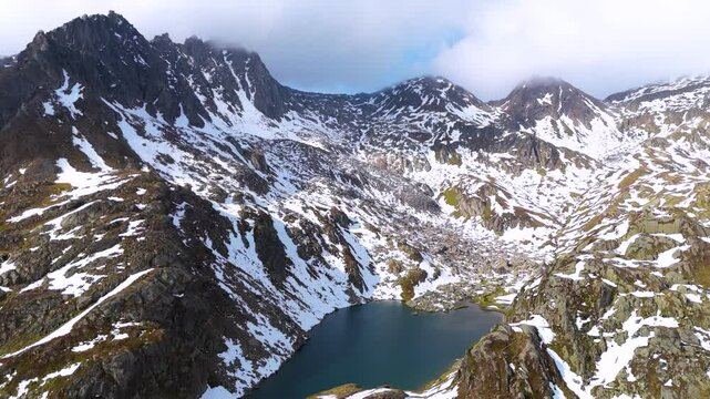 Aerial drone view of Rheinquelle Tomasee, Oberalp Pass, Canton Uri, Switzerland
