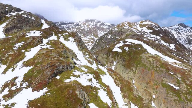 Aerial drone view of Rheinquelle Tomasee, Oberalp Pass, Canton Uri, Switzerland