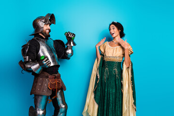 Whimsical Couple Dressed in Medieval Costume Celebrating, with a Colorful Background, Highlighting...