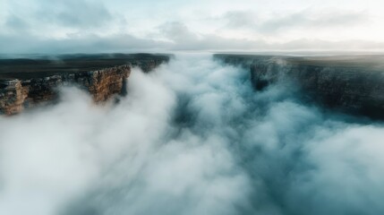 A breathtaking view of a canyon filled with dense clouds, creating an ethereal and serene atmosphere at twilight, enveloping the landscape in a mystical vibe.