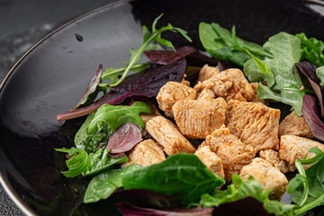 Salad turkey meat green leaves mix fresh  gourmet food background on the table rustic food top view copy space keto and paleo diet