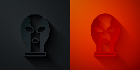Paper cut Mexican wrestler icon isolated on black and red background. Paper art style. Vector