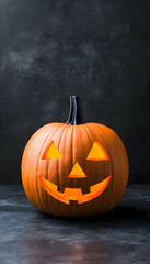 Glowing Jack-o'-lantern on dark surface