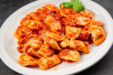Ravioli tomato sauce delicious gourmet food background on the table rustic food top view copy space