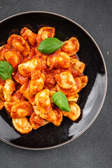 Ravioli tomato sauce delicious gourmet food background on the table rustic food top view copy space