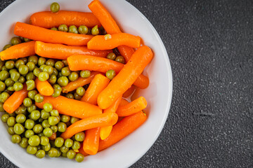 Green peas and carrot canned food tasty fresh delicious gourmet food background table rustic food top view copy space keto and paleo diet vegetarian and vegan food