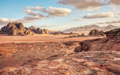 Planet Mars like arid landscape in Wadi Rum desert, Jordan, barren countryside with only rocks and sand