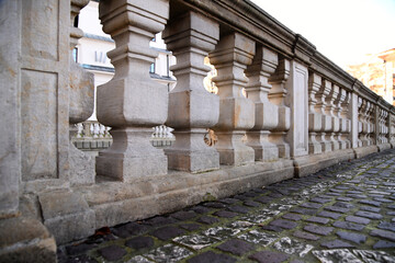 decorative fencing made of stone with elements of architectural design.