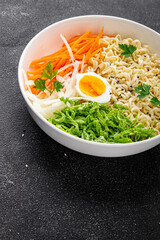 budda bowl noodles vegetables salad tasty fresh delicious gourmet food background table rustic food top view copy space keto and paleo diet vegetarian and vegan food