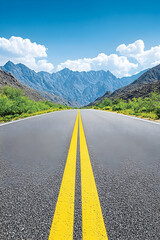 Open road leading into a mountainous landscape under a vibrant sky