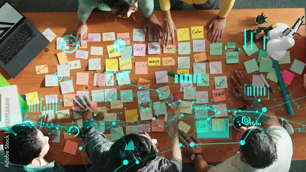 Aufkleber top down view of business team with casual outfit looking laptop screen and sharing idea. aerial vie