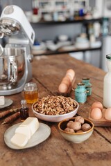 A cozy rustic kitchen features a vintage nutcracker cracking walnuts while displaying farm-to-table...
