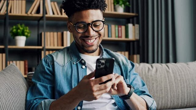The Smiling Man with Smartphone
