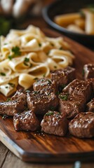 Gourmet Meal: A beautifully arranged culinary masterpiece featuring perfectly cooked steak bites alongside elegant pasta, garnished with fresh herbs.