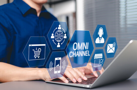Omni Channel Digital Marketing and E-Commerce concept. Businessman with omni-channel market icon, customer engagement, online sales, print ads, website, social media, call center, email, store, mobile
