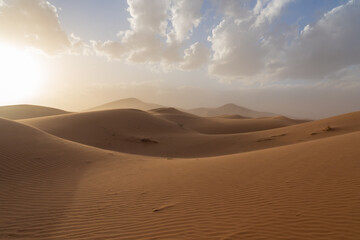 Wind blowing the sand in the Sahara Desert, Morocco, Africa.