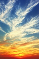 Fototapeta premium A calm and tranquil mood is set as the sky fills with a serene gradient of colors at sunset, transitioning from bright turquoise to warm golden yellows
