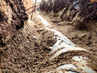 plastic sewer pipes in the ground for sewage and rainwater drainage