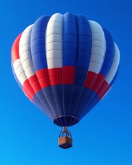 A beautifully crafted vintage hot air balloon with detailed patterns in red, white, and blue. Its whimsical design brings charm to any location, creating a sense of adventure