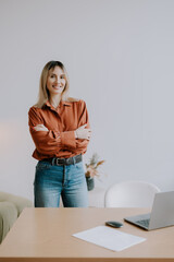 Business portrait of a woman administrating her small business.