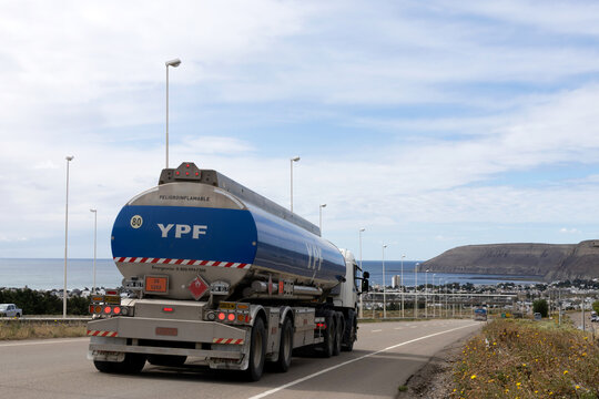 A YPF tanker truck carrying fuel traveling on the highway towards the city of Comodoro Rivadavia in Argentina