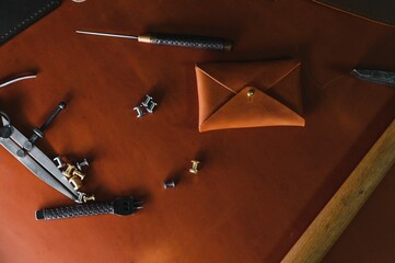 Tools for leather craft on leather backgroung