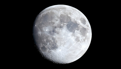Obraz premium Close-up view of the moon's surface. Detailed craters and light variations are prominent