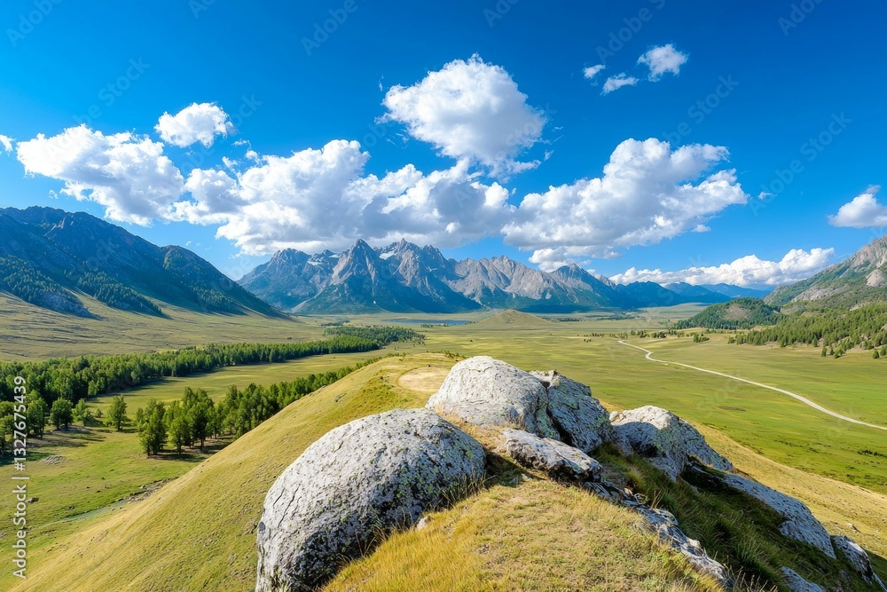 Poster mountain range is visible in the distance with a large rock on top of a hill