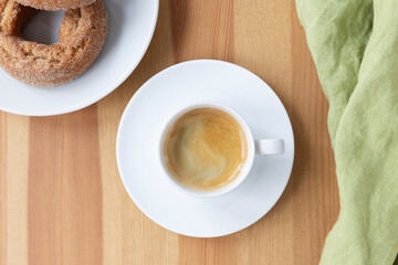 Flat Lay of Espresso with Donuts.