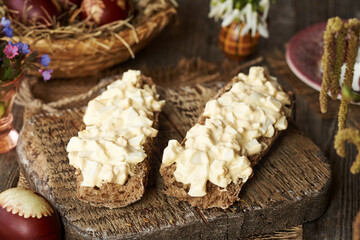 Two slices of bread with bread spread made of leftover Easter eggs