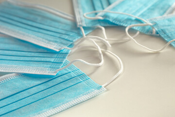 Many medical disposable blue masks. Background for presentations of the medical industry.