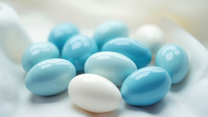 Macro shot of jordan almonds on delicate ivory fabric.
