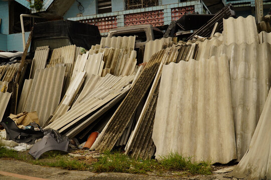 Dangerous asbestos, eternit as a building material, which is banned in many countries due to the cancer risk posed by microfibers. Old parts for sale at a building materials dealer. Fortaleza, Brazil.
