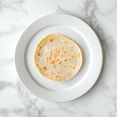 Tortilla on a White Plate