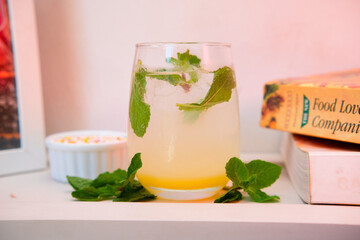 mojito cocktail on wooden table