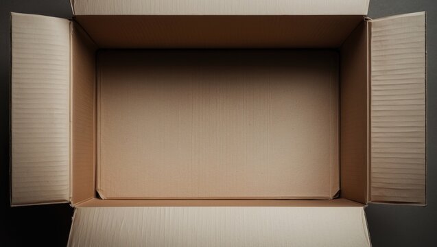Close-up top view of an opened empty cardboard box, parcel ready for dispatch. Advertisement for delivery services to customers. E-commerce, package for personal items during moving, relocation day.