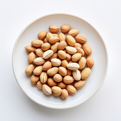 A bowl of nuts with a white background