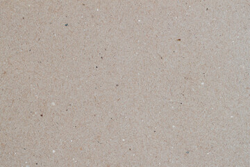 Empty rough cardboard texture. Recycled rough paper texture with visible fibers and natural imperfections. Eco friendly and organic background for design projects
