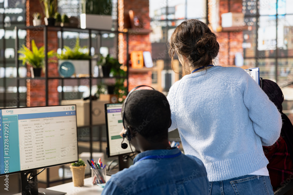 Poster customer service manager supervising agents logging customer interactions in csm system. call center