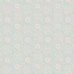 Pastel blue mandala-style floral pattern with delicate circular motifs. Suitable for textiles, wallpapers, and boho decorative designs.