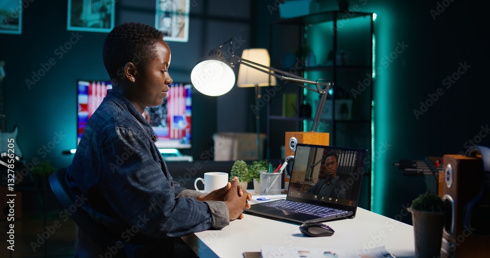 Poster remote employee calls manager remotely using internet videocall to ask for feedback on project progr